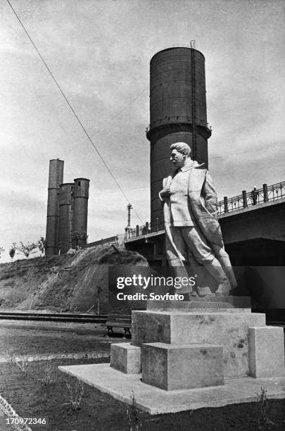 Statue of joseph stalin on the grounds of the mariupol steel mill, ukraine, ussr, 1940.
