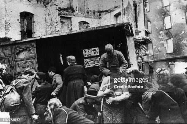 Red army soldiers distributing bread to berlin residents after germany's surrender, world war 2, 1945.