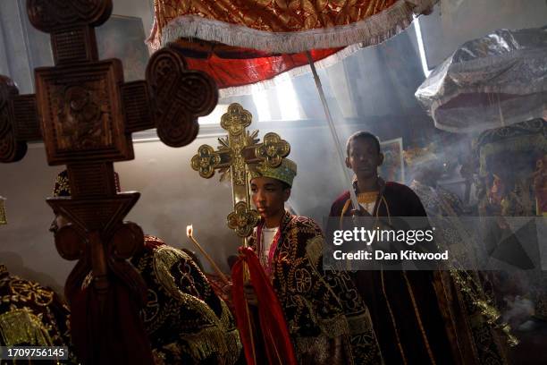 Members of the Ethiopian community take part in a joint celebration of Meskel, and the restitution of a sacred Tabot, at the Ethiopian Orthodox...