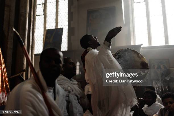 Members of the Ethiopian community take part in a joint celebration of Meskel, and the restitution of a sacred Tabot, at the Ethiopian Orthodox...