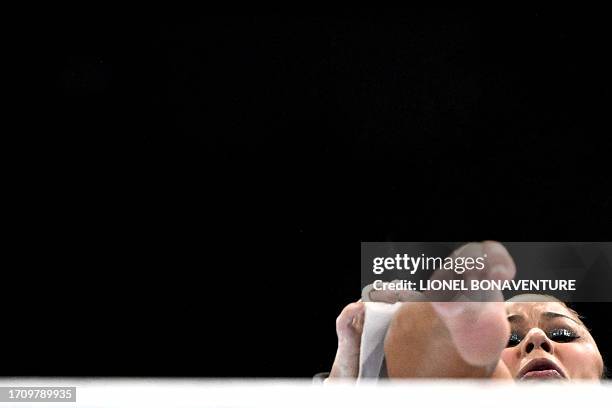 Brasil's Flavia Saraiva competes on the Uneven Bars in the Women's Individual All-Around Final during the 52nd FIG Artistic Gymnastics World...