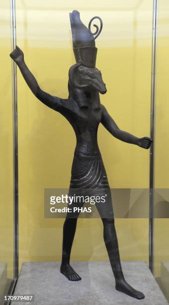 Set. God of the desert, storms, and foreigners in ancient Egyptian religion and also the god of darkness, and chaos. Statue. Bronze and silver. 19th...