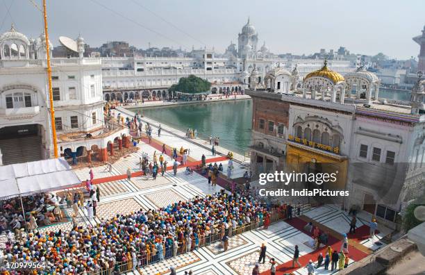 Devotees at Golden temple, Amritsar, Punjab, India.