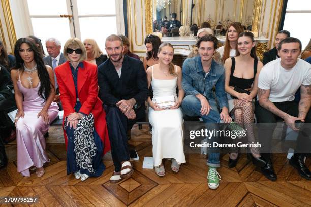 Kim Kardashian, Anna Wintour, David Beckham, Harper Beckham, Cruz Beckham, Nicola Peltz Beckham and Brooklyn Beckham attend the Victoria Beckham SS24...
