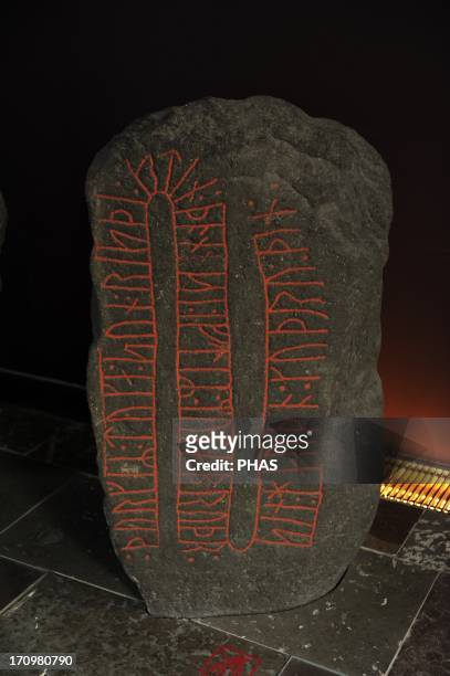 Art. Metal Age. Germanic. Viking Age. Northern Europe. Asferg. 1000 AD. Runestone. Dedication to a deceased man. Thorger Toke's son raised this stone...