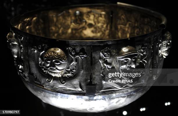The Gundestrup cauldron. Decorated silver vessel, thought to date between 200 BC and 300 AD, placing it within the late La Tene period or early Roman...