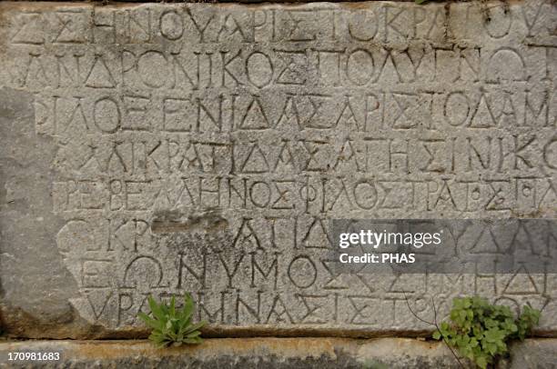 Greece. Sparta. Inscription on the stone. Greek writing. Old Theater. Peloponnese.