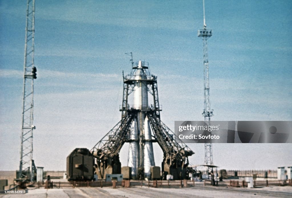 Vostok rocket carrying the sputnik 1 satellite on the launch pad in 1957, this is a still from a soviet film of the launch.