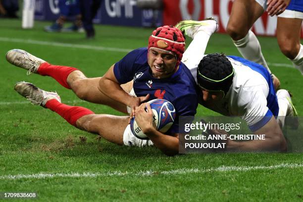 France's left wing Louis Bielle-Biarrey dives to cross the line to score France's second try during the France 2023 Rugby World Cup Pool A match...