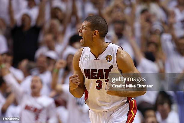 Shane Battier of the Miami Heat reacts after making a three-pointer in the third quarter against the San Antonio Spurs during Game Seven of the 2013...