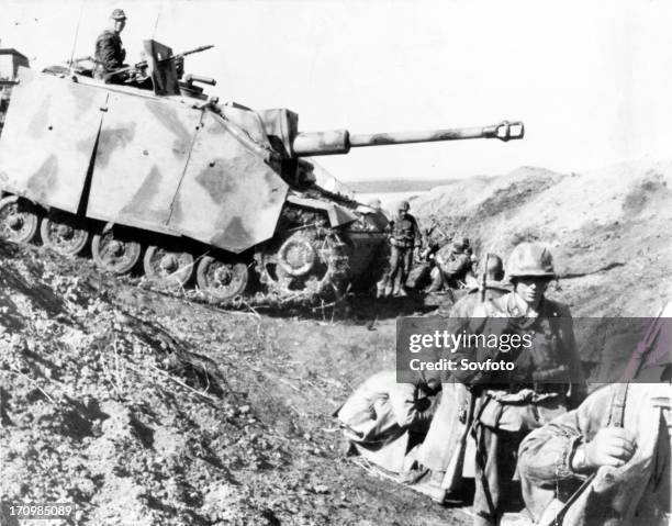 Heavy german tank crosses a russian tank ditch near belgorod during the kursk battle august 1943, the big russian summer attack made the germans turn...