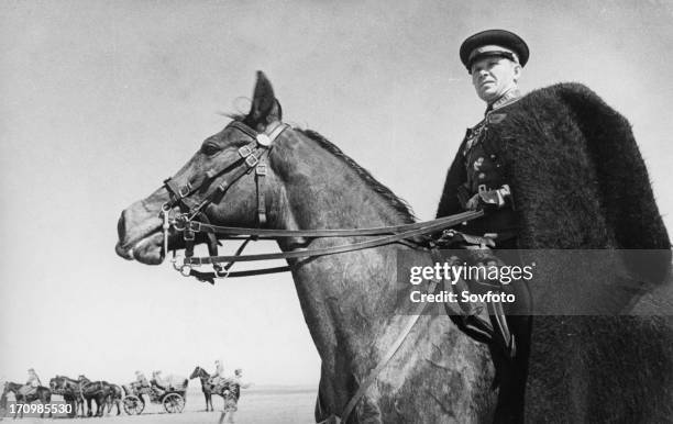 Commander of a cossack unit watching the progress of his troops on the south-western front, may 1942.