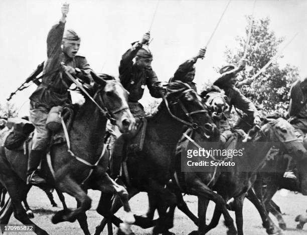 Red army cavalry charge with sabers drawn, following the tanks into the action, world war ll.