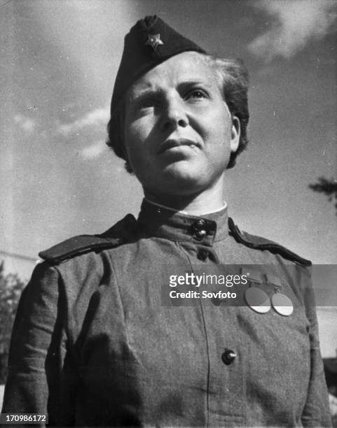 World war 2, a,a, dneprovskaya, a famous scout and heroine of the leningrad front, is secretary of the battalion committee of the young communist...