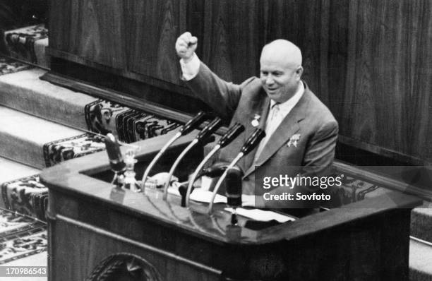 Nikita khrushchev speaking from the rostrum of the 3rd soviet writers' congress, 'long live soviet writers, loyal assistants of our party in the...