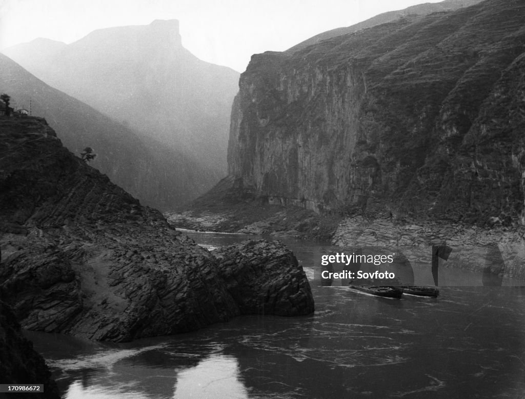 Two cargo ships in chu-tang gorge, one of the three gorges of the yangtze river, szechuan province, china, 1950s.