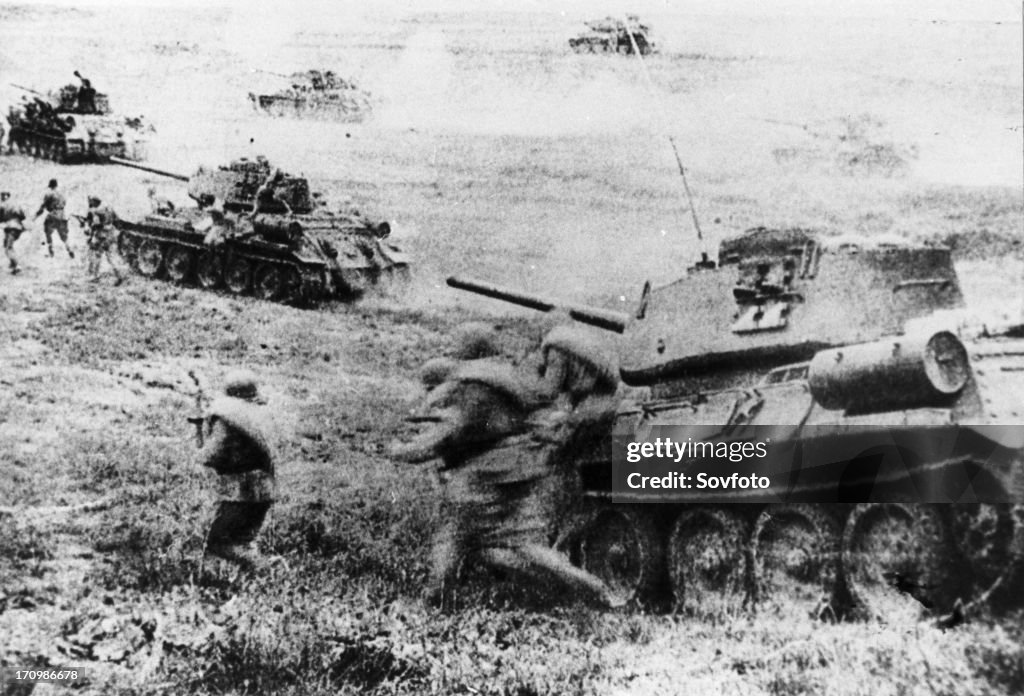 World war ll, red army soldiers and soviet t-34 tanks on the attack during the battle of kursk, july 1943.