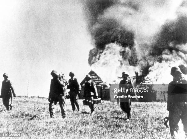 German soldiers burn villages near pskov, 1941.