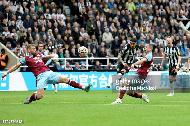 Miguel Almiron of Newcastle United scores the team's first goal during the Premier League match between Newcastle United and Burnley FC at St. James...