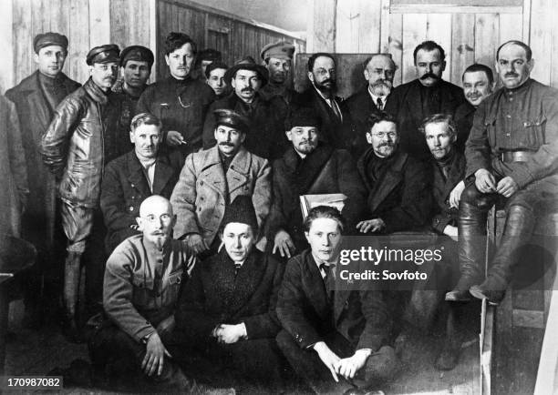 I, lenin, m,i, kalinin, i,v, stalin in a group of delegates of the 8th meeting of the bolshevik communist party in moscow, march 1919.