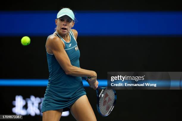 Magda Linette of Poland returns a shot against Victoria Azarenka of Belarus on day 5 of the 2023 China Open at National Tennis Center on September...