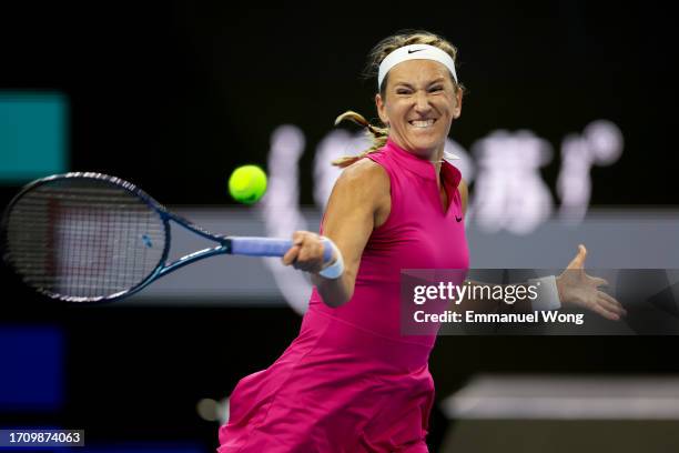 Victoria Azarenka of Belarus returns a shot against Magda Linette of Poland on day 5 of the 2023 China Open at National Tennis Center on September...