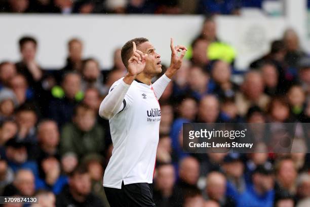 Carlton Morris of Luton Town celebrates after scoring the team's second goal during the Premier League match between Everton FC and Luton Town at...