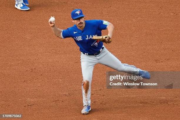 Davis Schneider of the Toronto Blue Jays throws to first against the Boston Red Sox during the fourth inning at Fenway Park on August 5, 2023 in...