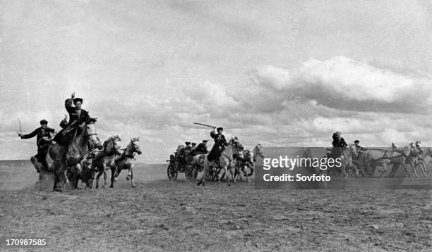 Cossack machine-gun carriages advancing to the firing lines during world war ll, may 1942.