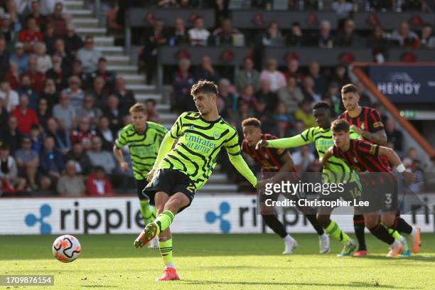 Kai Havertz of Arsenal scores the team's third goal from a penalty during the Premier League match between AFC Bournemouth and Arsenal FC at Vitality...