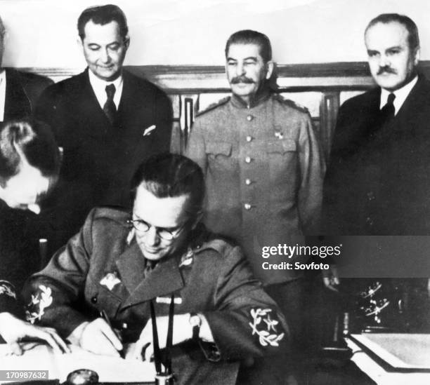 Tito , stalin and molotov at the signing ceremony of the yugoslavia and ussr friendship treaty in apr, 1945.