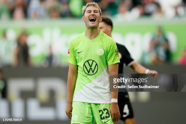 Jonas Wind of VfL Wolfsburg celebrates after scoring the team's second goal during the Bundesliga match between VfL Wolfsburg and Eintracht Frankfurt...