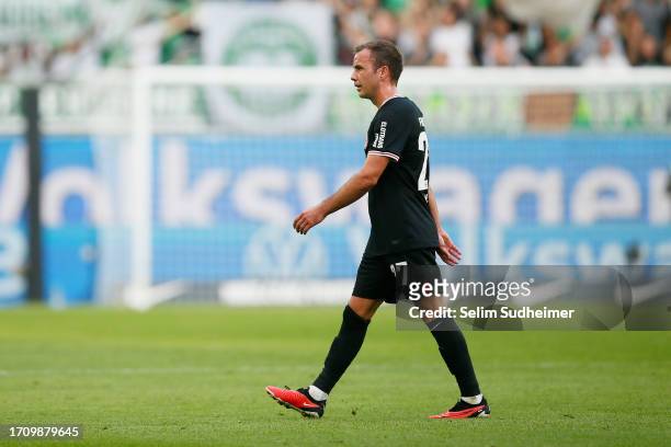 Mario Goetze of Eintracht Frankfurt leaves the field dejected after being shown a red card by Referee Frank Willenborg during the Bundesliga match...