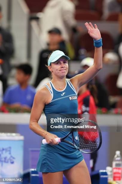Magda Linette of Poland reacts after winning the round of 64 match against Victoria Azarenka of Belarus on day 5 of the 2023 China Open at National...