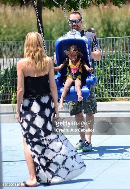 Heidi Klum, Lou Sulola Samuel and Martin Kristen are seen in Tribeca Hudson River Park on June 20, 2013 in New York City.