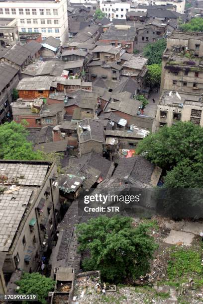 View of the crowded homes in the 3,000-year-old Chongqing city, built on top of steep hills squeezed onto a narrow strip of land between China's...