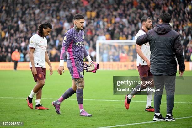 Ederson of Manchester City walks off the pitch after the team's defeat in the Premier League match between Wolverhampton Wanderers and Manchester...