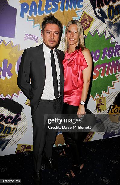 Darren Strowger and Clare Strowger attend The Hoping Foundation's 'Rock On', a benefit evening for Palestinian refugee children, at Cafe de Paris on...