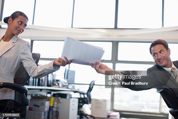 Hand Between Files Handing Files Photos and Premium High Res Pictures - Getty Images