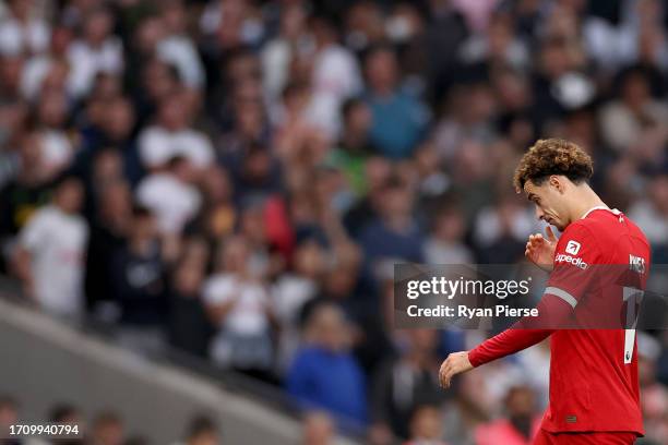 Curtis Jones of Liverpool leaves the pitch after being shown a red card during the Premier League match between Tottenham Hotspur and Liverpool FC at...