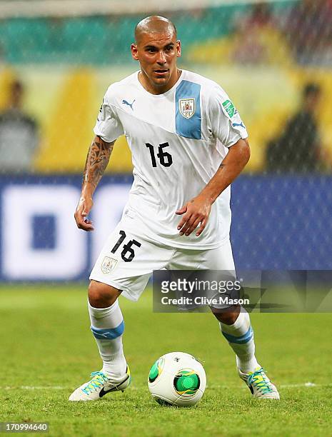 Maxi Pereira of Uruguay in action during the FIFA Confederations Cup Brazil 2013 Group B match between Nigeria and Uruguay at Estadio Octavio...