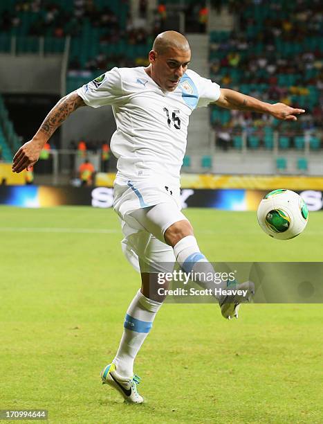 Maxi Pereira of Uruguay in action during the FIFA Confederations Cup Brazil 2013 Group B match between Nigeria and Uruguay at Estadio Octavio...