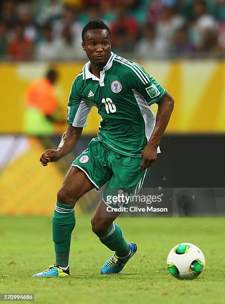 Mikel John Obi of Nigeria in action during the FIFA Confederations Cup Brazil 2013 Group B match between Nigeria and Uruguay at Estadio Octavio...