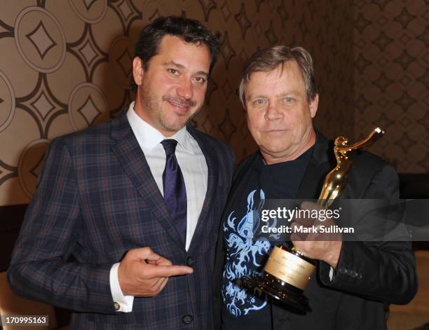 Actor Mark Hamill poses backstage with Jonathan Block-Verk, President and CEO of PromaxBDA Global International after receiving the Don LaFontaine...