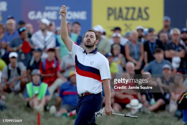 Patrick Cantlay of Team United States gestures in celebration of winning his match 1 up during the Saturday afternoon fourball matches of the 2023...