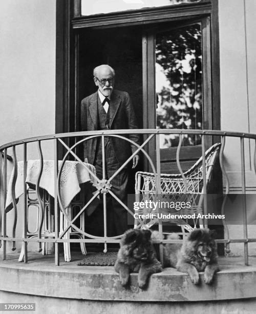 Professor Sigmund Freud at his home with his dogs in Vienna on his 80th birthday, Vienna, Austria, 1936.