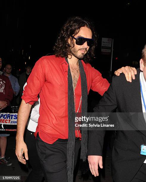 Russell Brand leaving Cafe de Paris Club on June 20, 2013 in London, England.