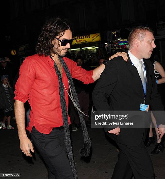 Russell Brand leaving Cafe de Paris Club on June 20, 2013 in London, England.