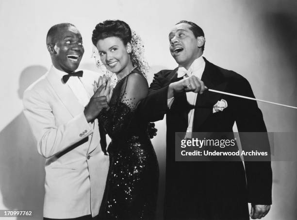Singer, dancer and actress Lena Horne with Bill 'Bojangles' Robinson and Cab Calloway in the musical film 'Stormy Weather,' Hollywood, California,...