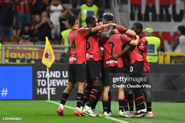 Christian Pulisic of AC Milan celebrates with teammates after scoring his team's first goal during the Serie A TIM match between AC Milan and SS...